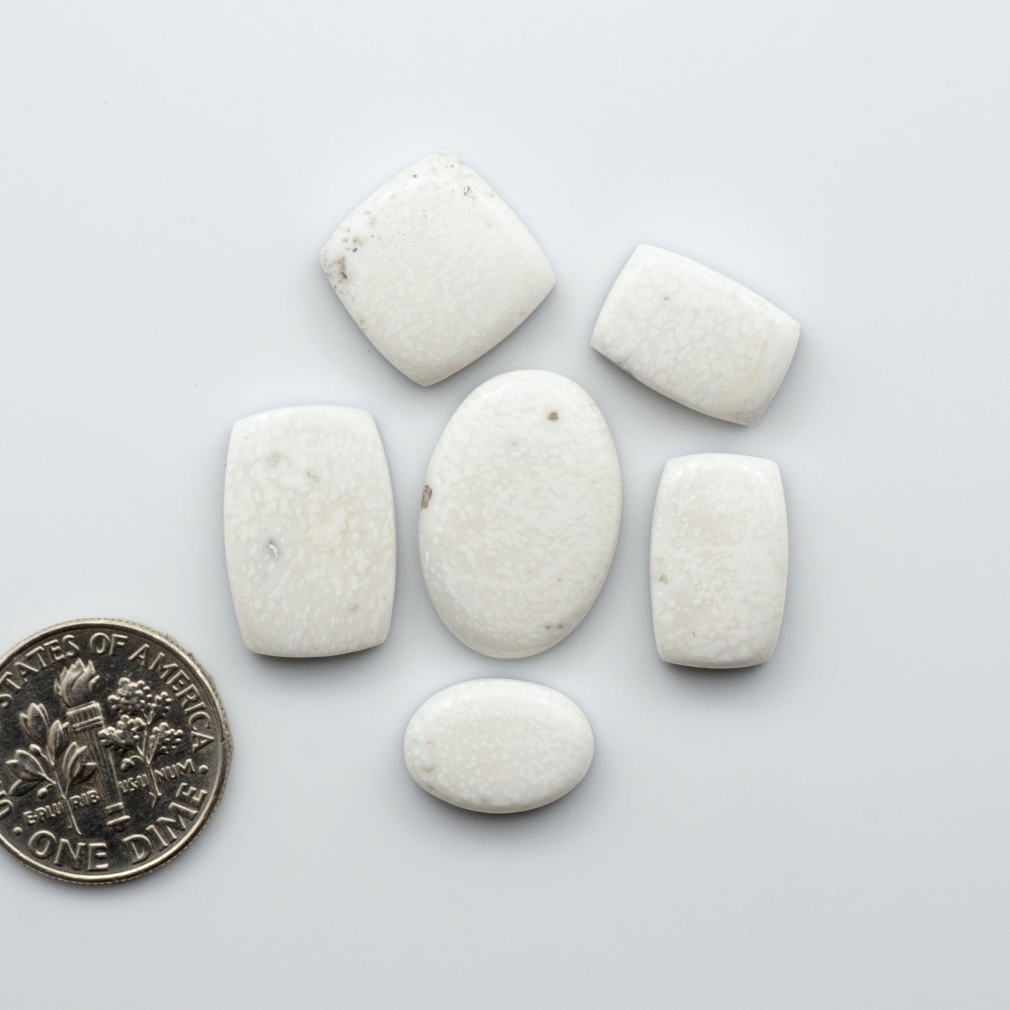 Our Natural White Buffalo Stone Cabochons are semi-precious gemstones cut into shapes ideal for jewelry-making, crafting and are backed for added strength.