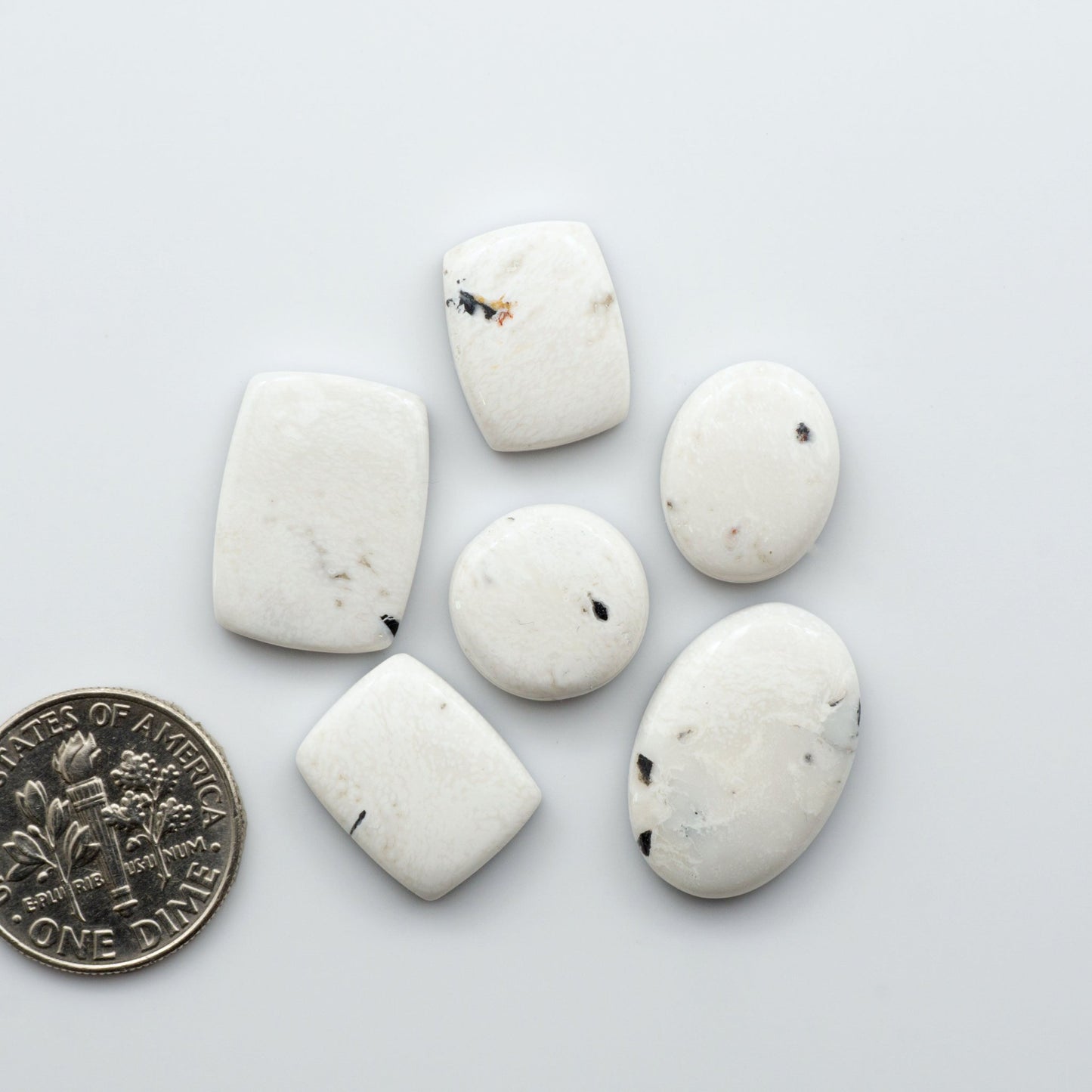 Our Natural White Buffalo Stone Cabochons are semi-precious gemstones cut into shapes ideal for jewelry-making, crafting and are backed for added strength.