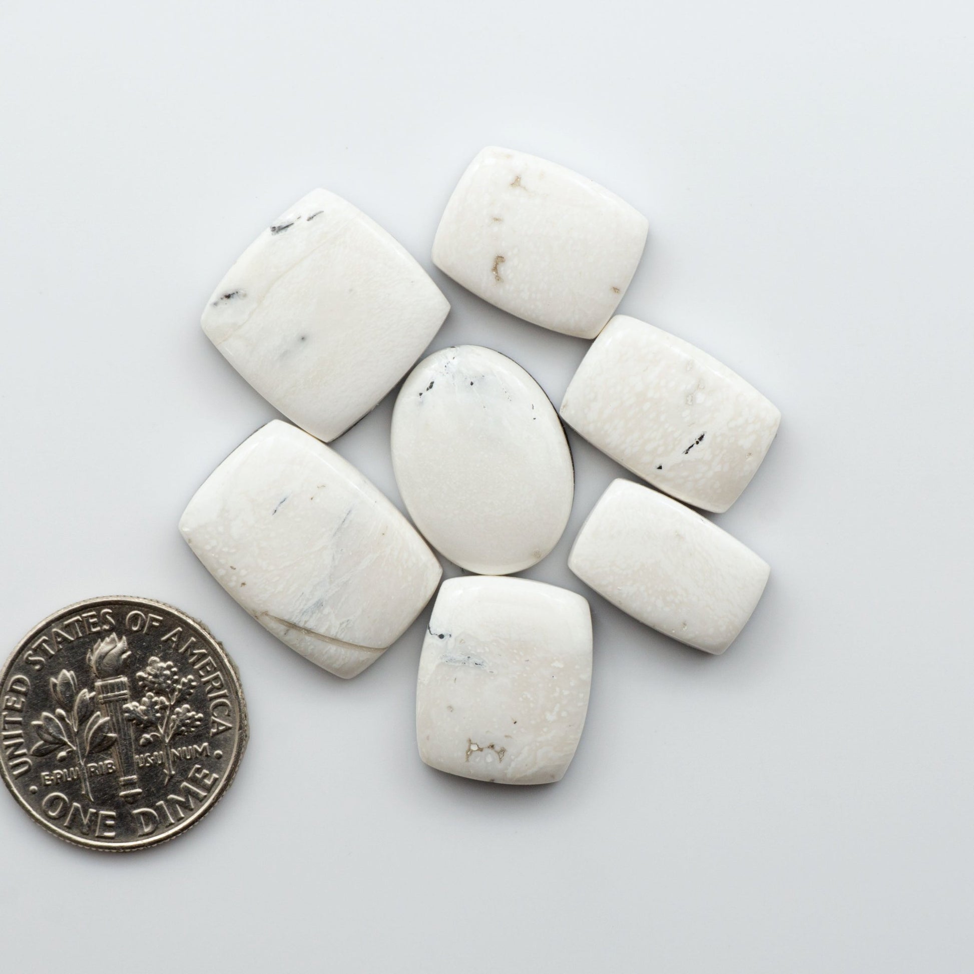 Our Natural White Buffalo Stone Cabochons are semi-precious gemstones cut into shapes ideal for jewelry-making, crafting and are backed for added strength.