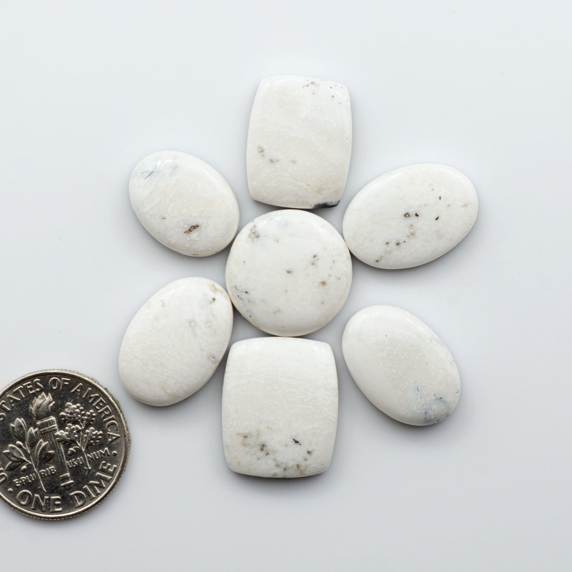 Our Natural White Buffalo Stone Cabochons are semi-precious gemstones cut into shapes ideal for jewelry-making, crafting and are backed for added strength.