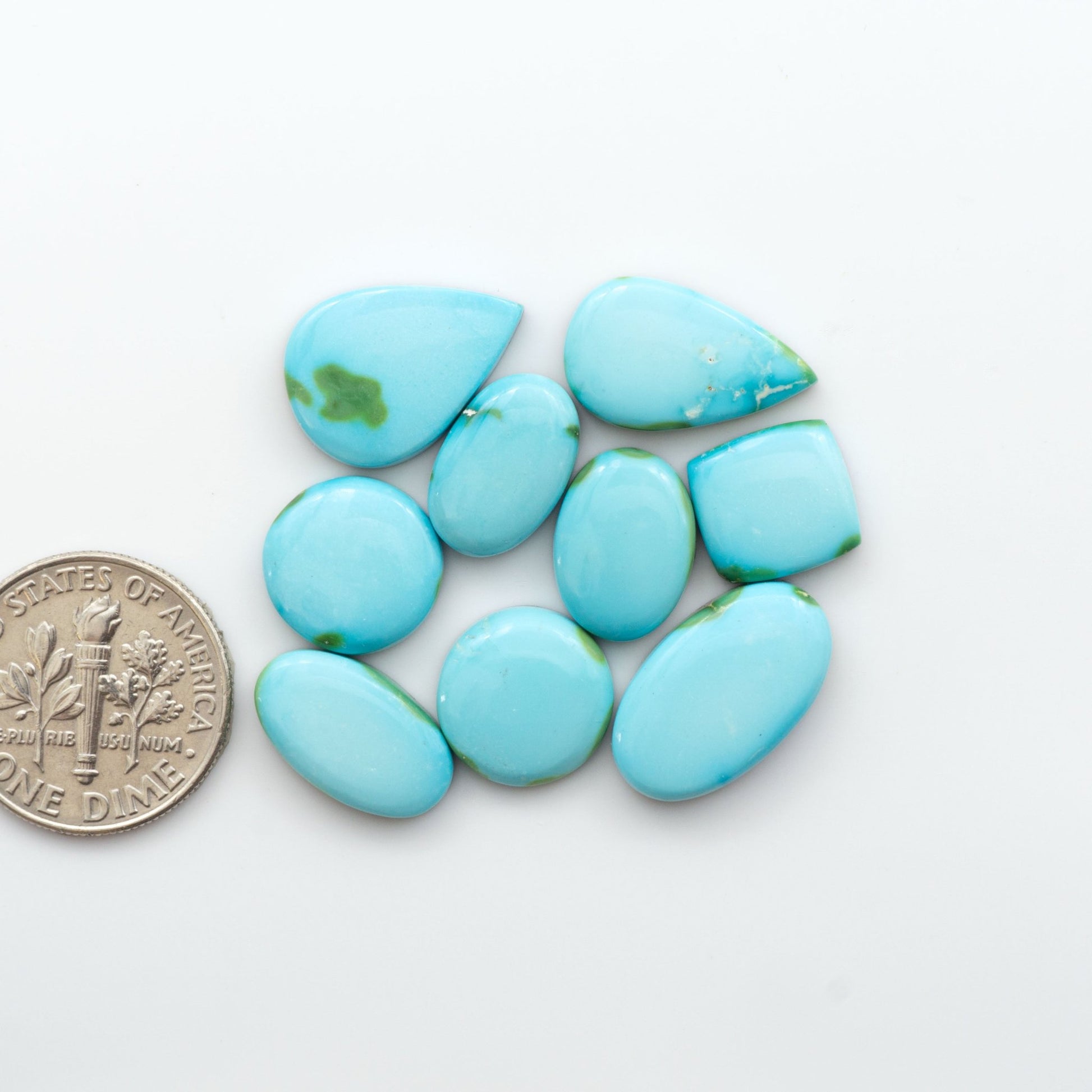 Discover the unique beauty of Sonoran Mountain Turquoise. This rare gemstone showcases a stunning blend of blue and green hues.