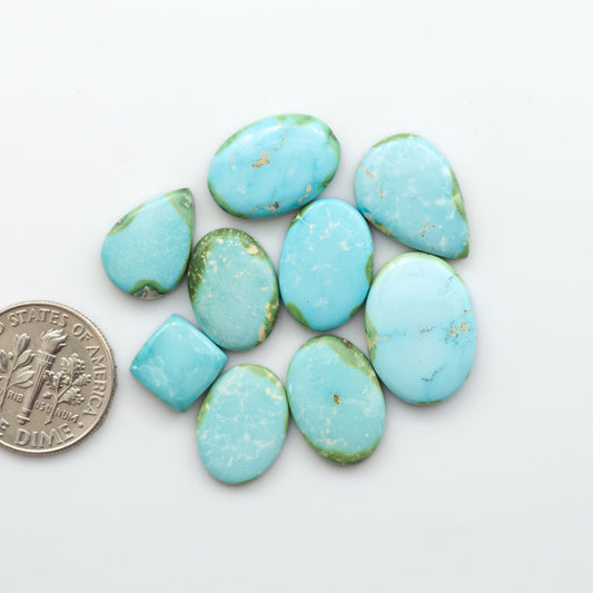 Discover the unique beauty of Sonoran Mountain Turquoise. This rare gemstone showcases a stunning blend of blue and green hues.