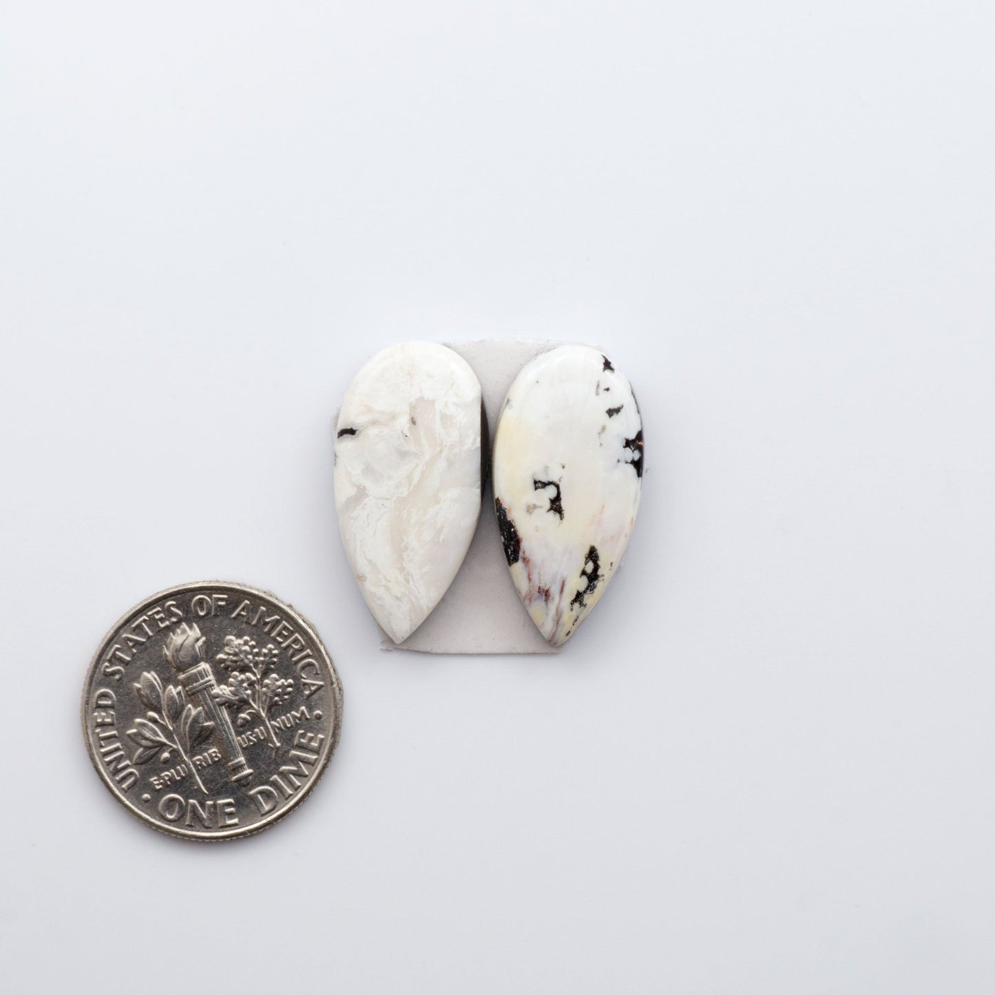 Our Natural White Buffalo Stone Cabochons are semi-precious gemstones cut into shapes ideal for jewelry-making, crafting and are backed for added strength. 