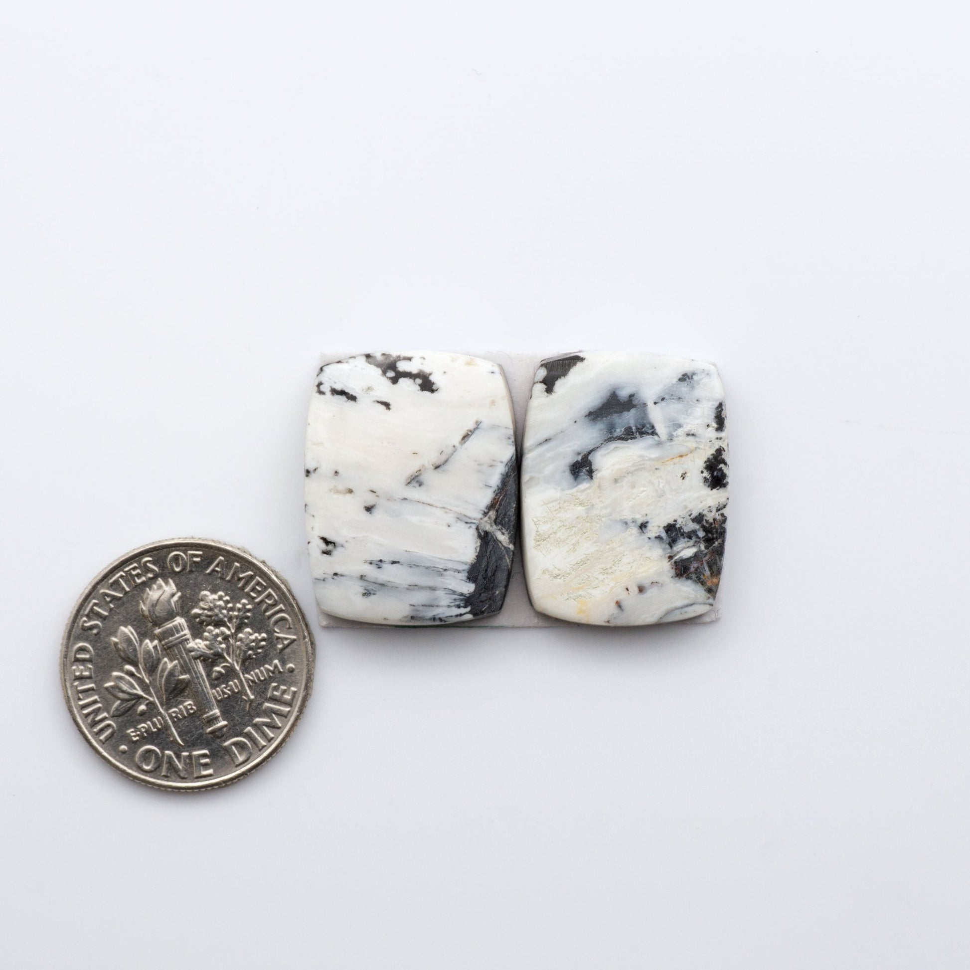 Our Natural White Buffalo Stone Cabochons are semi-precious gemstones cut into shapes ideal for jewelry-making, crafting and are backed for added strength. 