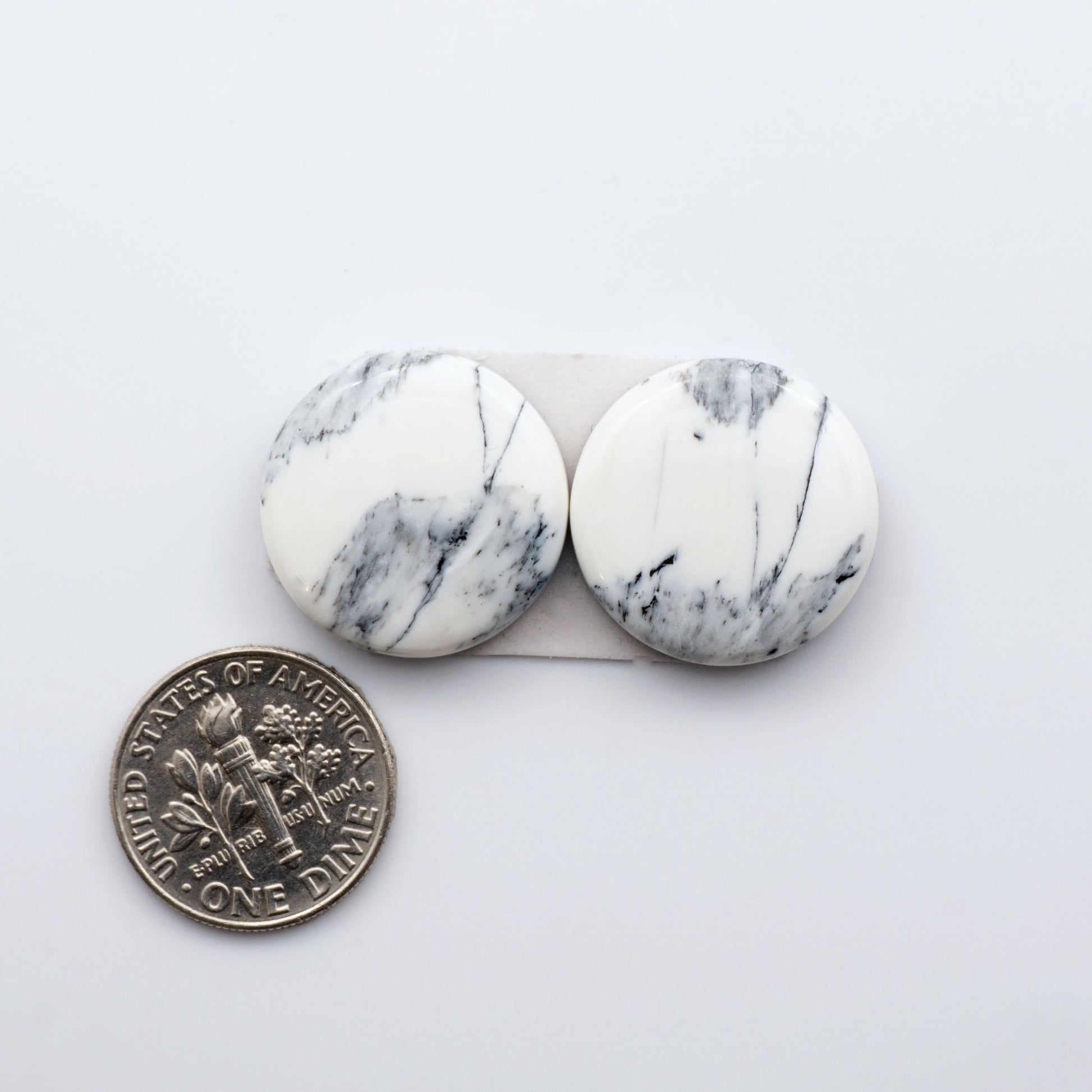 Our Natural White Buffalo Stone Cabochons are semi-precious gemstones cut into shapes ideal for jewelry-making, crafting and are backed for added strength. 