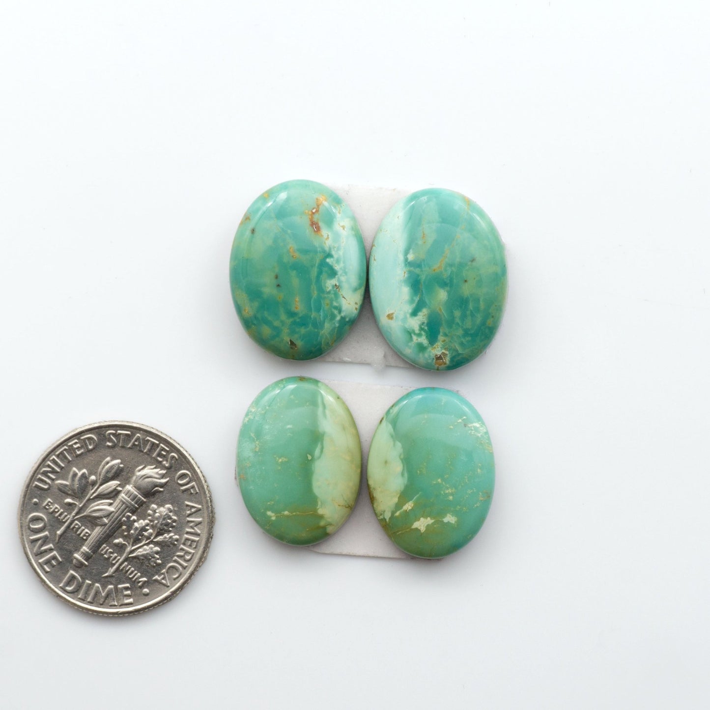 Experience the beauty of our stunning Turquoise Mountain Cabochons. With their distinctive blue and green color, these cabochons are perfect for adding a touch of natural elegance to any jewelry piece.