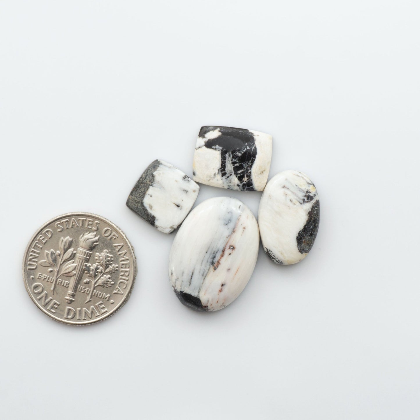 Our Natural White Buffalo Stone Cabochons are semi-precious gemstones cut into shapes ideal for jewelry-making, crafting and are backed for added strength.