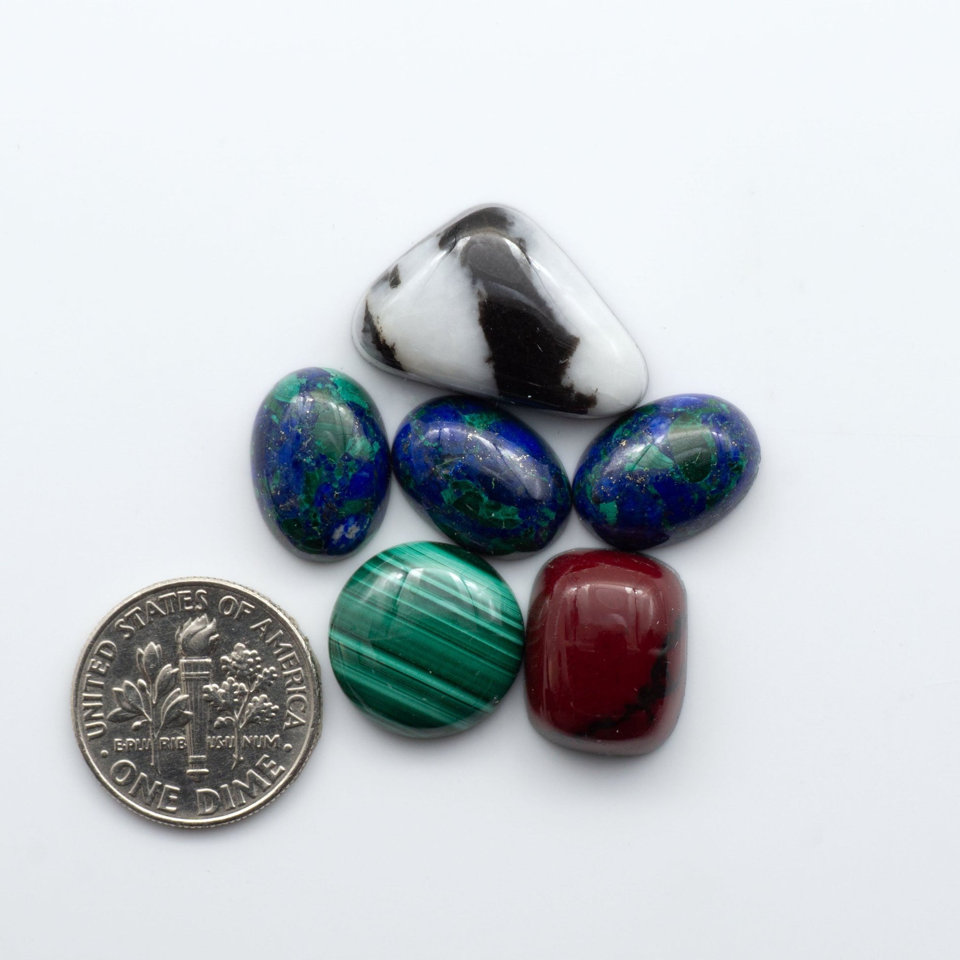 This Mixed lot contains an assortment of gemstones. Perfect for jewelry making or display, each piece is truly one-of-a-kind, 