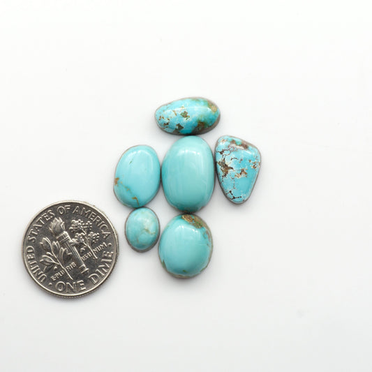 Natural Royston Turquoise is renowned for its unique shades of green and blue, making these cabochons a popular choice for jewelry makers. 