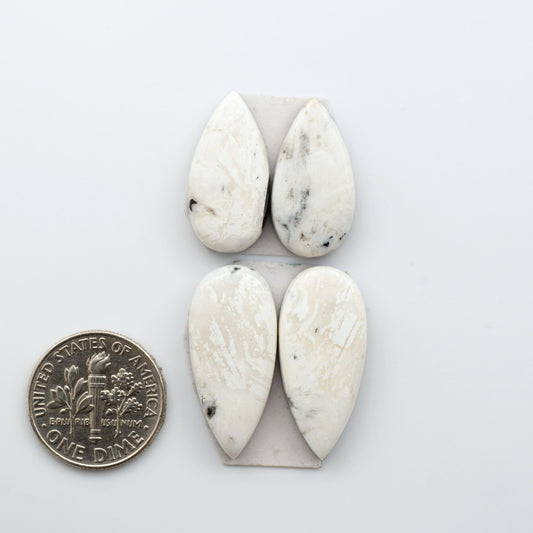 White Buffalo Stone Cabochons are semi-precious gemstones backed for added strength and cut into shapes ideal for jewelry-making and crafting. 