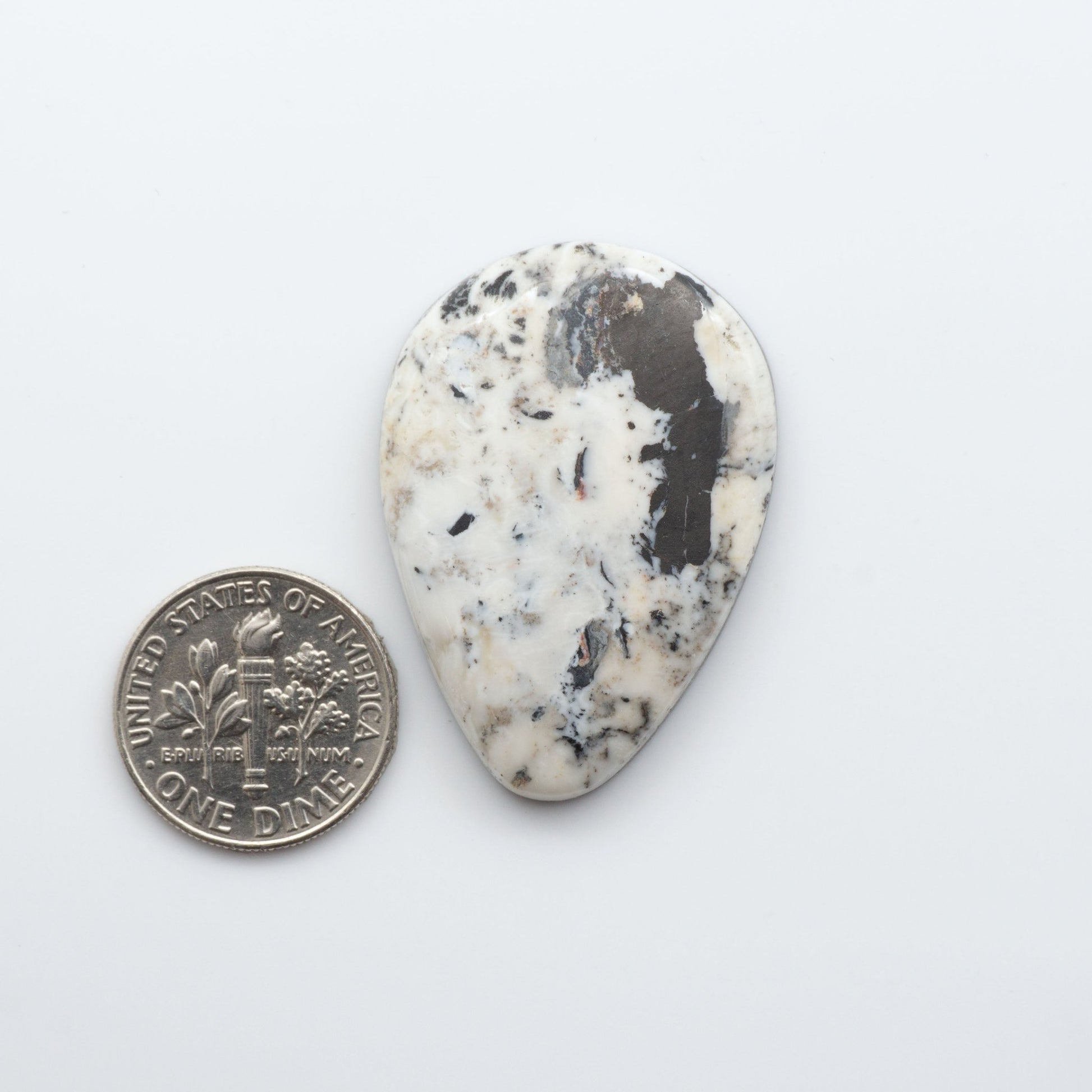 These Natural White Buffalo Stone Cabochons are semi-precious gemstones cut into shapes ideal for jewelry-making 