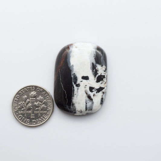 These Natural White Buffalo Stone Cabochons are semi-precious gemstones cut into shapes ideal for jewelry-making 