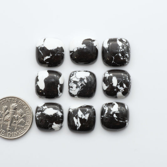 These White Buffalo Cabochons are expertly cut and polished from composite material to create a stunning and durable gemstone.