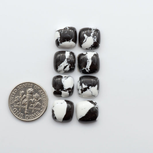 These White Buffalo Cabochons are expertly cut and polished from composite material to create a stunning and durable gemstone.