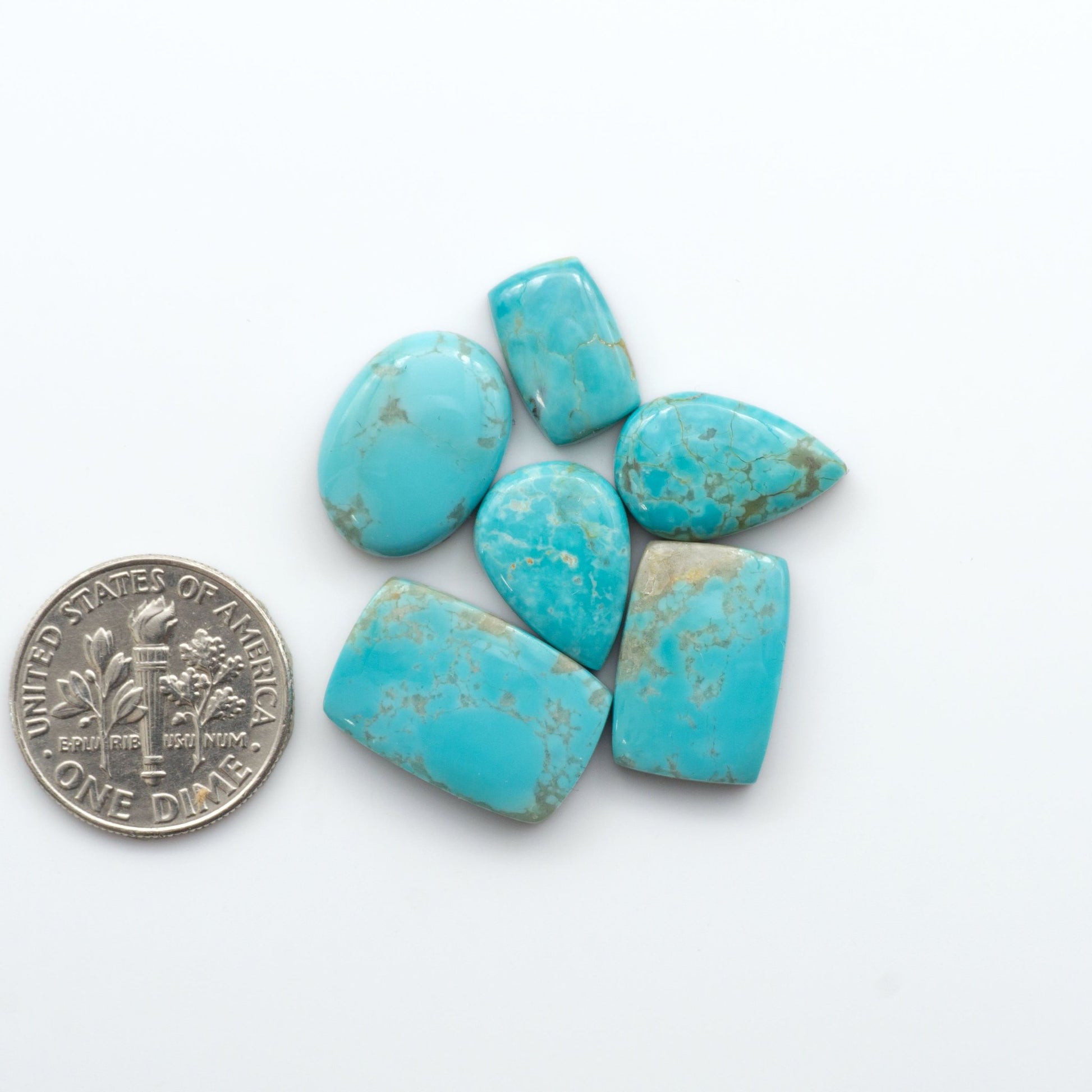 Add a touch of unique beauty to your collection with our stunning Pilot Mountain Turquoise cabochons. Mined in Nevada, USA, 