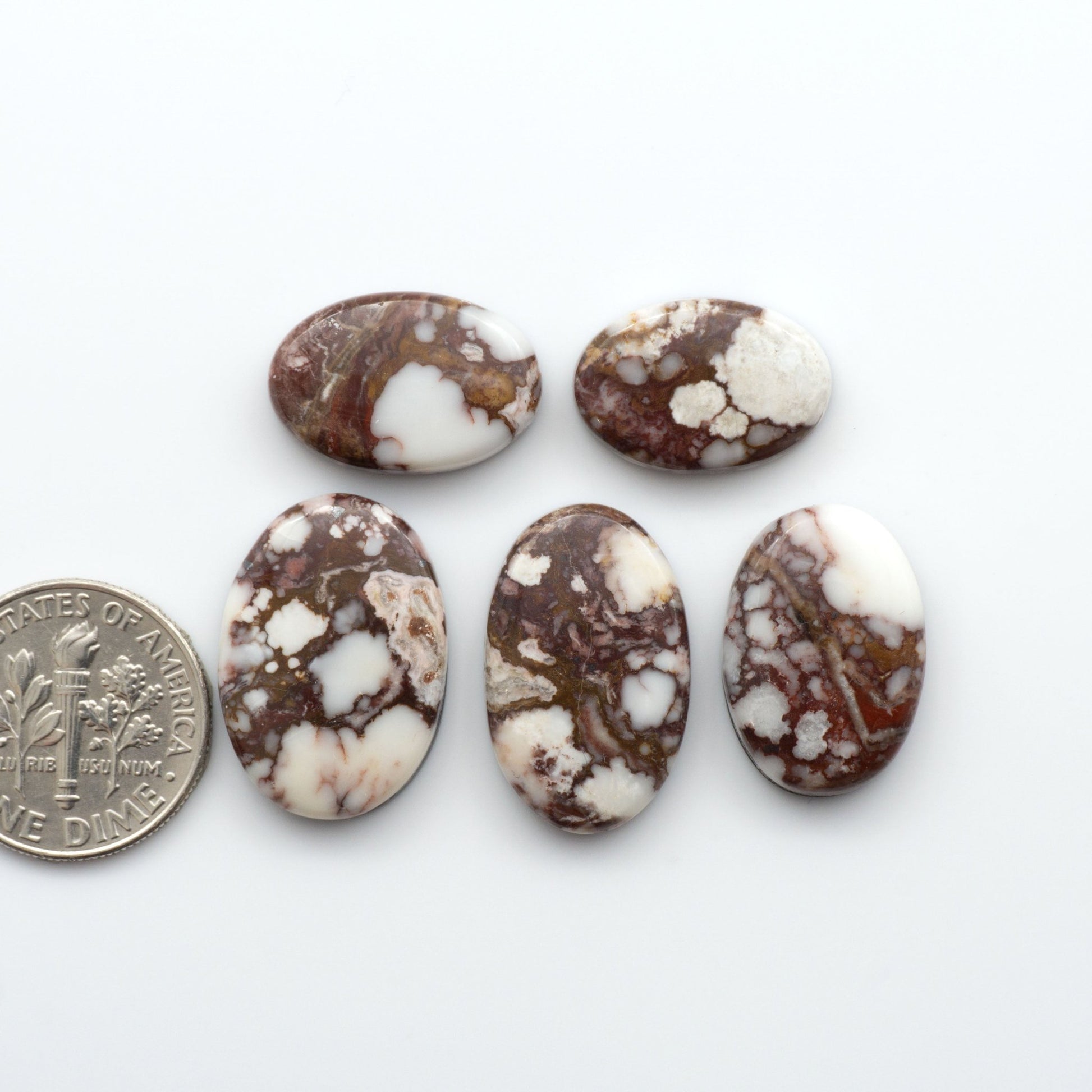 Wild Horse Cabochons are a magnificent addition to any collection. These natural magnesite stones feature an intricate design that will add beauty to any jewelry design.