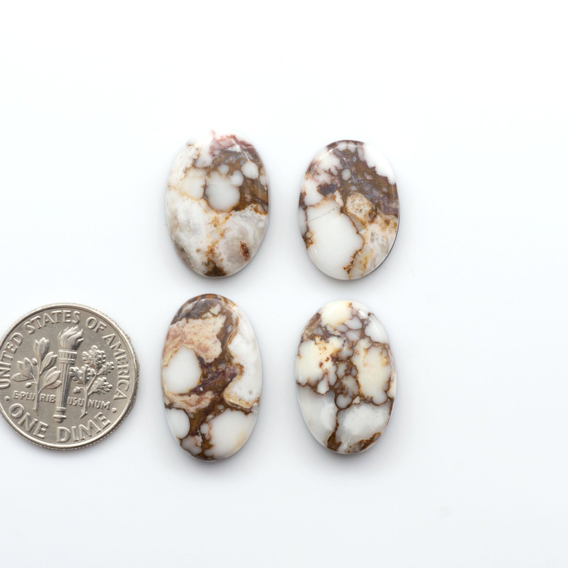 Wild Horse Cabochons are a magnificent addition to any collection. These natural magnesite stones feature an intricate design that will add beauty to any jewelry design.