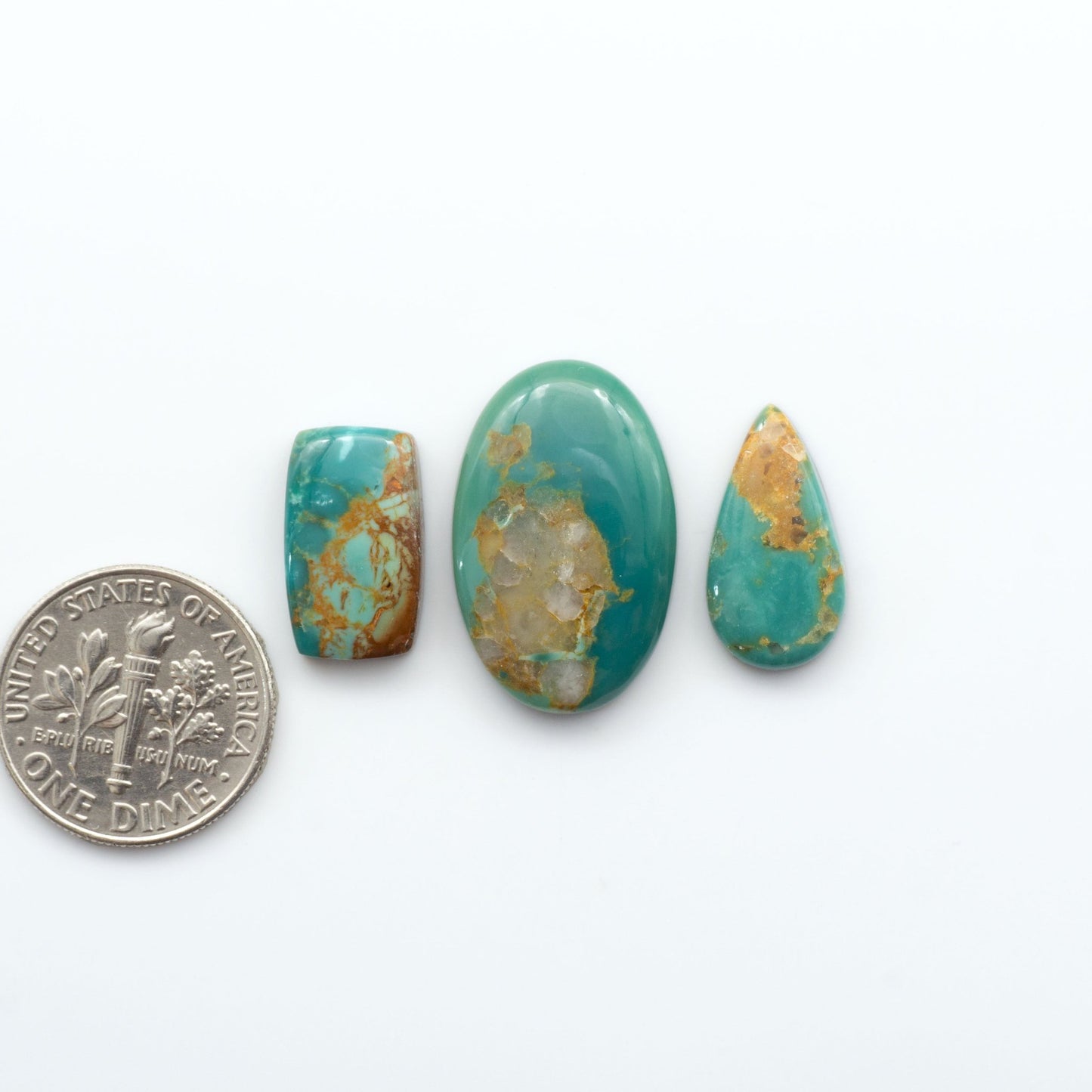 Our stunning Turquoise Mountain Cabochons, with their distinctive blue and green color, these cabochons are perfect for any jewelry piece.