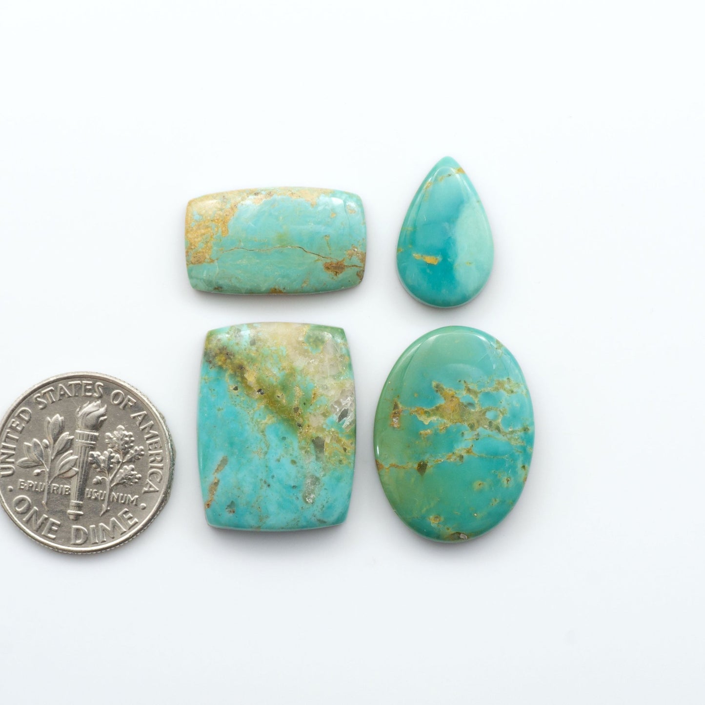 Our stunning Turquoise Mountain Cabochons, with their distinctive blue and green color, these cabochons are perfect for any jewelry piece.