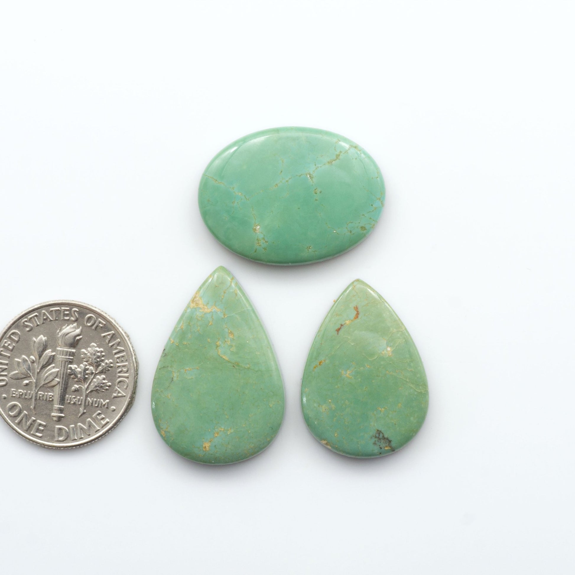 Our stunning Turquoise Mountain Cabochons, with their distinctive blue and green color, these cabochons are perfect for any jewelry piece.