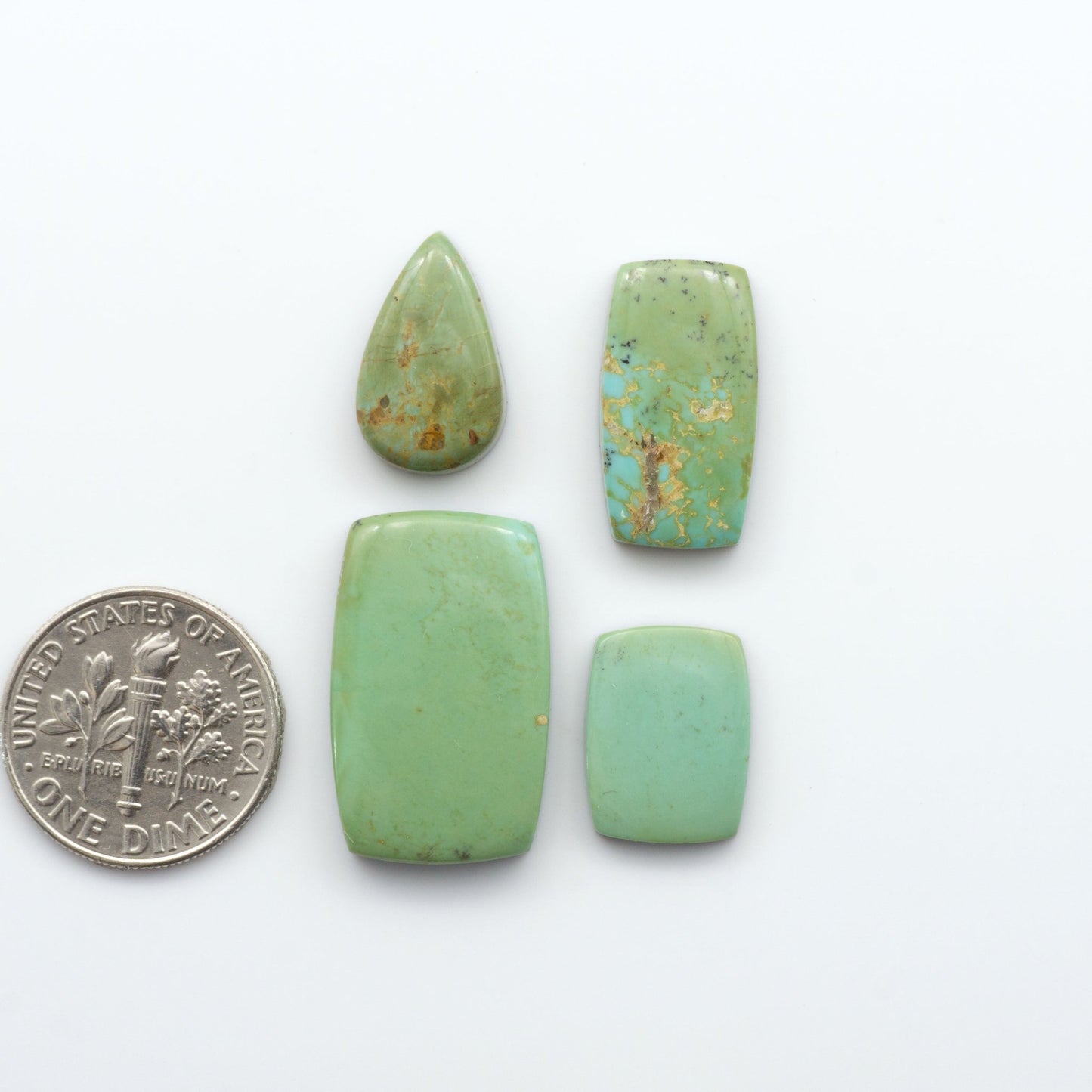 Our stunning Turquoise Mountain Cabochons, with their distinctive blue and green color, these cabochons are perfect for any jewelry piece.