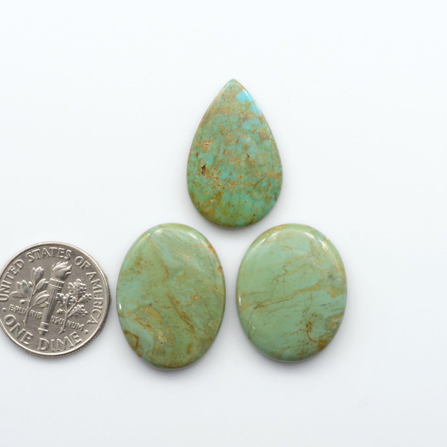 Our stunning Turquoise Mountain Cabochons, with their distinctive blue and green color, these cabochons are perfect for any jewelry piece.