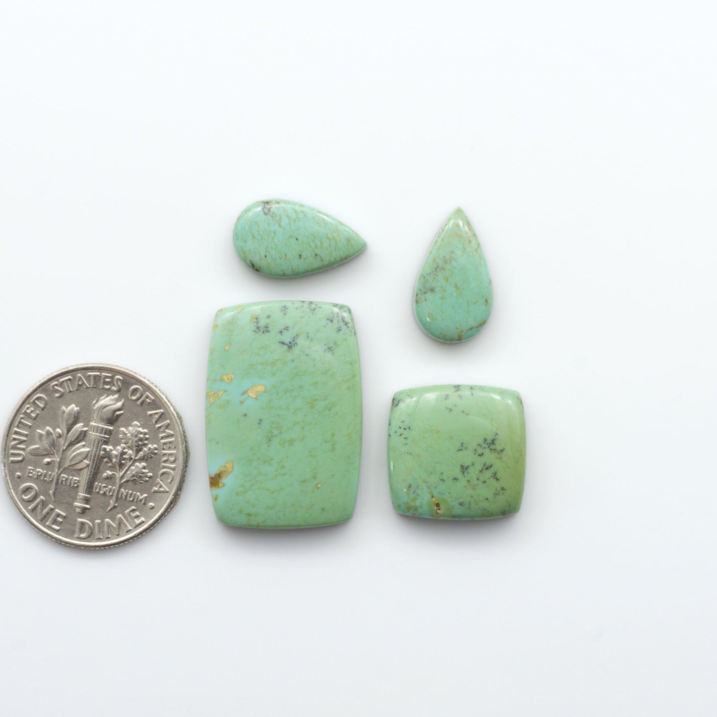 Our stunning Turquoise Mountain Cabochons, with their distinctive blue and green color, these cabochons are perfect for any jewelry piece.