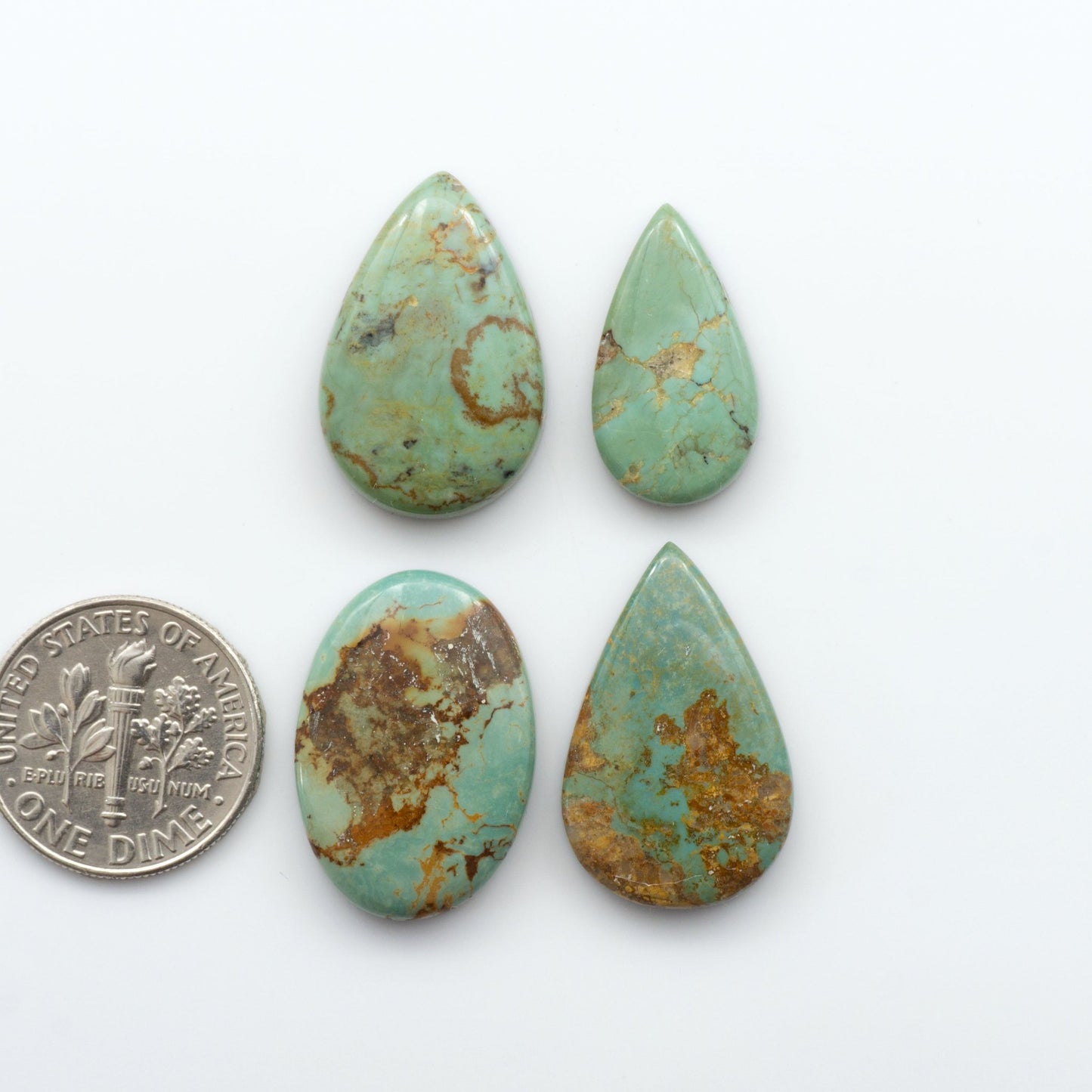 Our stunning Turquoise Mountain Cabochons, with their distinctive blue and green color, these cabochons are perfect for any jewelry piece.