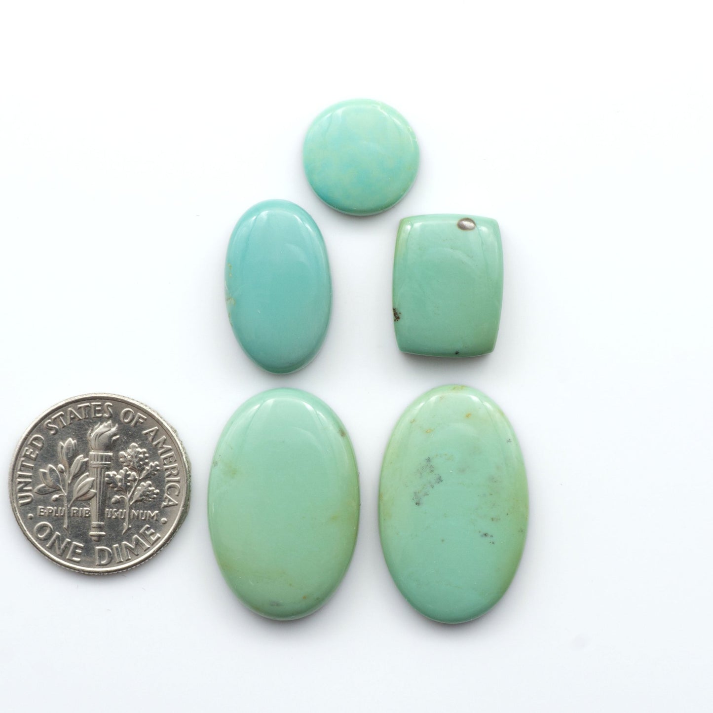 our stunning Turquoise Mountain Cabochons, with their distinctive blue and green color, are perfect for adding a touch of elegance to any jewelry piece.