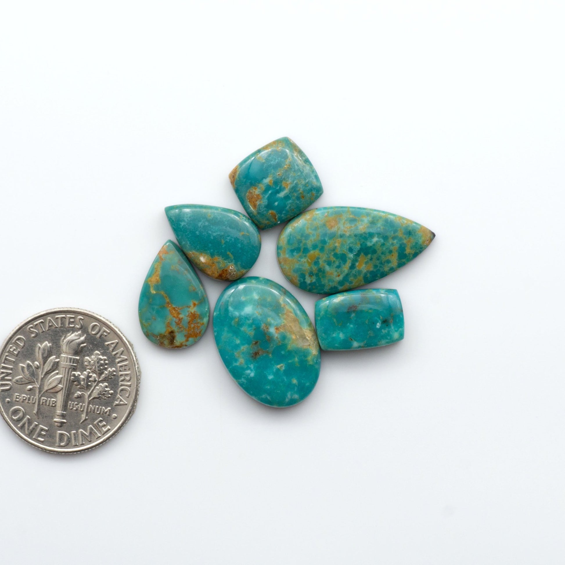 Experience the beauty of Turquoise Mountain Cabochons. With their distinctive blue and green color, these gemstones are perfect for any jewelry piece.