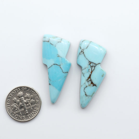 Enhance your jewelry designs with Pressed Turquoise Nugget Cabochons. Crafted from composite materials they add a captivating touch to your creations.