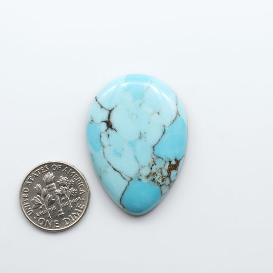 Enhance your jewelry designs with Pressed Turquoise Nugget Cabochons. Crafted from composite materials they add a captivating touch to your creations.