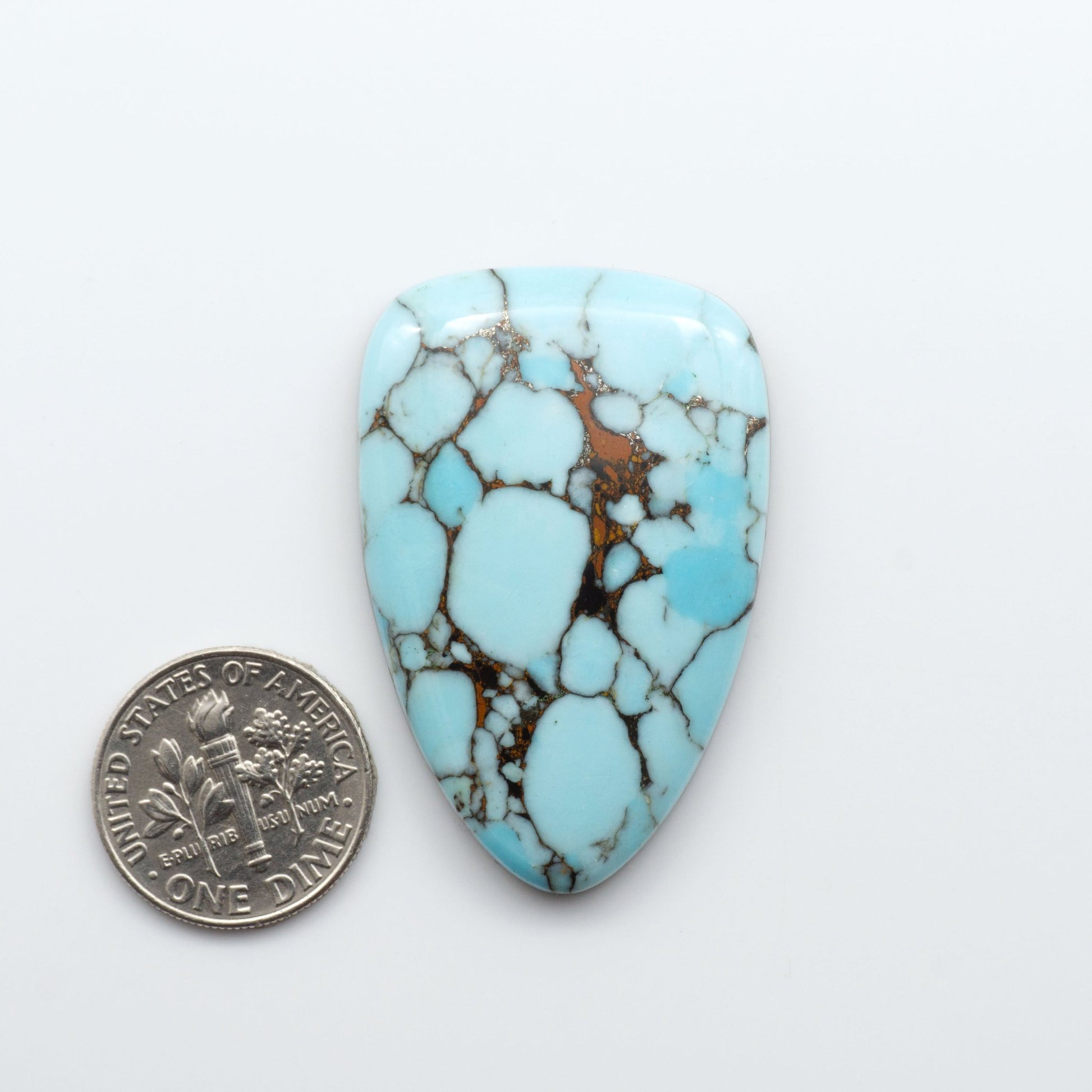 Enhance your jewelry designs with Pressed Turquoise Nugget Cabochons. Crafted from composite materials they add a captivating touch to your creations.