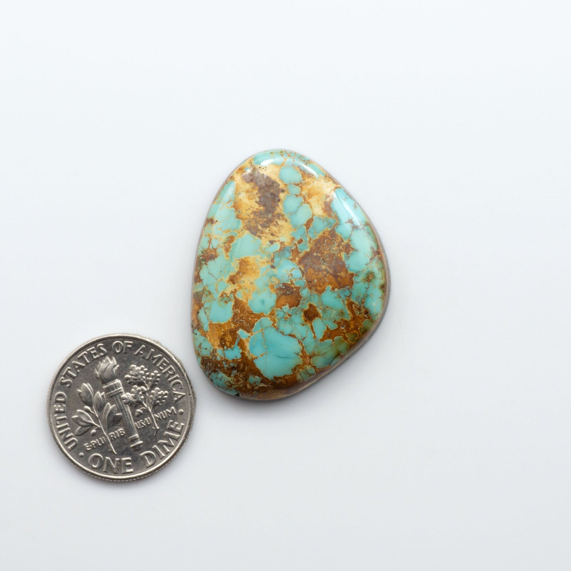 Royston Turquoise cabochons are famous for their distinctive matrix and unique green and blue hues, making them a favored option among jewelry designers.