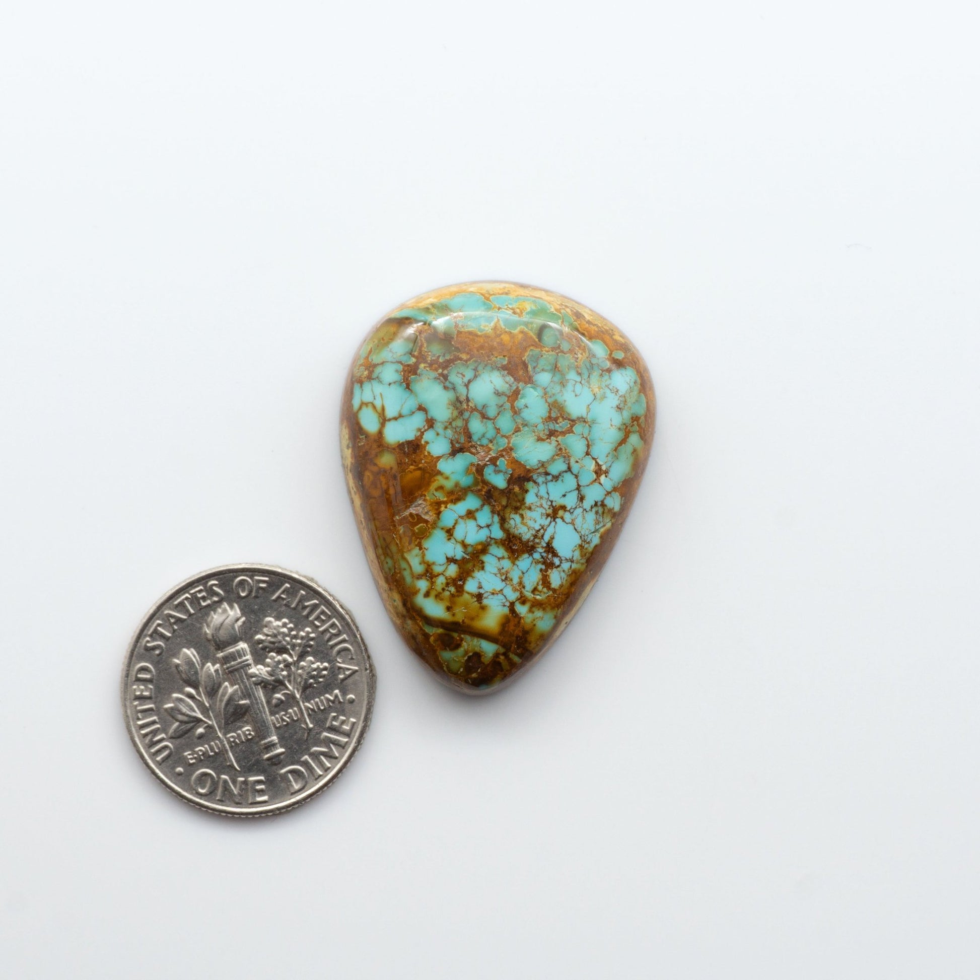 Royston Turquoise cabochons are famous for their distinctive matrix and unique green and blue hues, making them a favored option among jewelry designers.