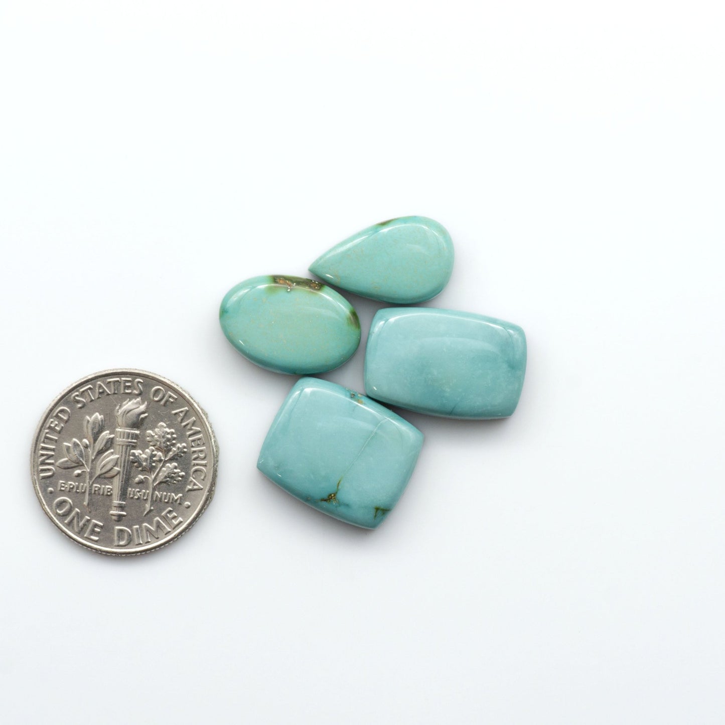 Discover the unique beauty of Sonoran Mountain Turquoise, it's stunning blend of blue and green hues make it a must-have for any jewelry collection. 