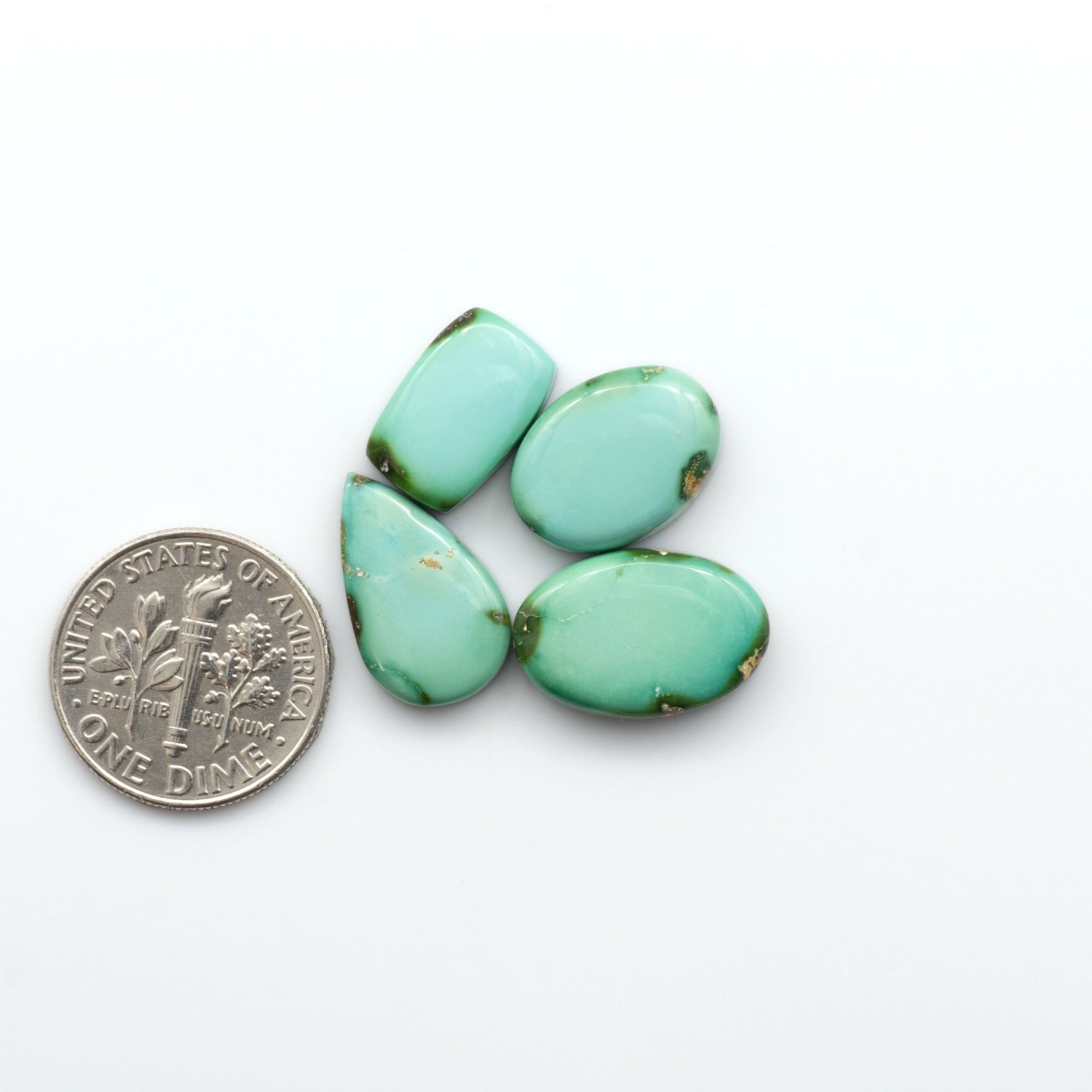 Discover the unique beauty of Sonoran Mountain Turquoise, it's stunning blend of blue and green hues make it a must-have for any jewelry collection. 