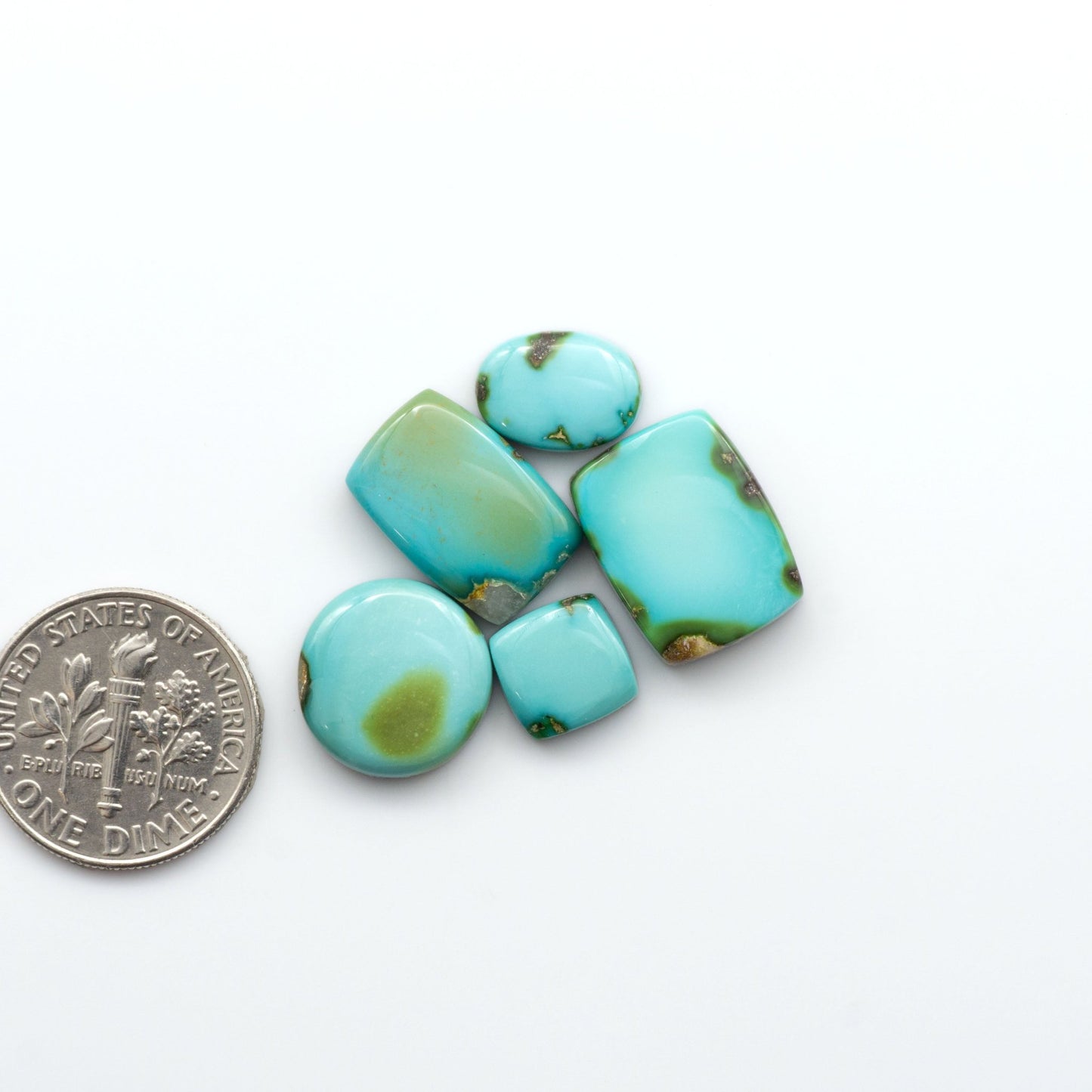 Discover the unique beauty of Sonoran Mountain Turquoise, it's stunning blend of blue and green hues make it a must-have for any jewelry collection. 