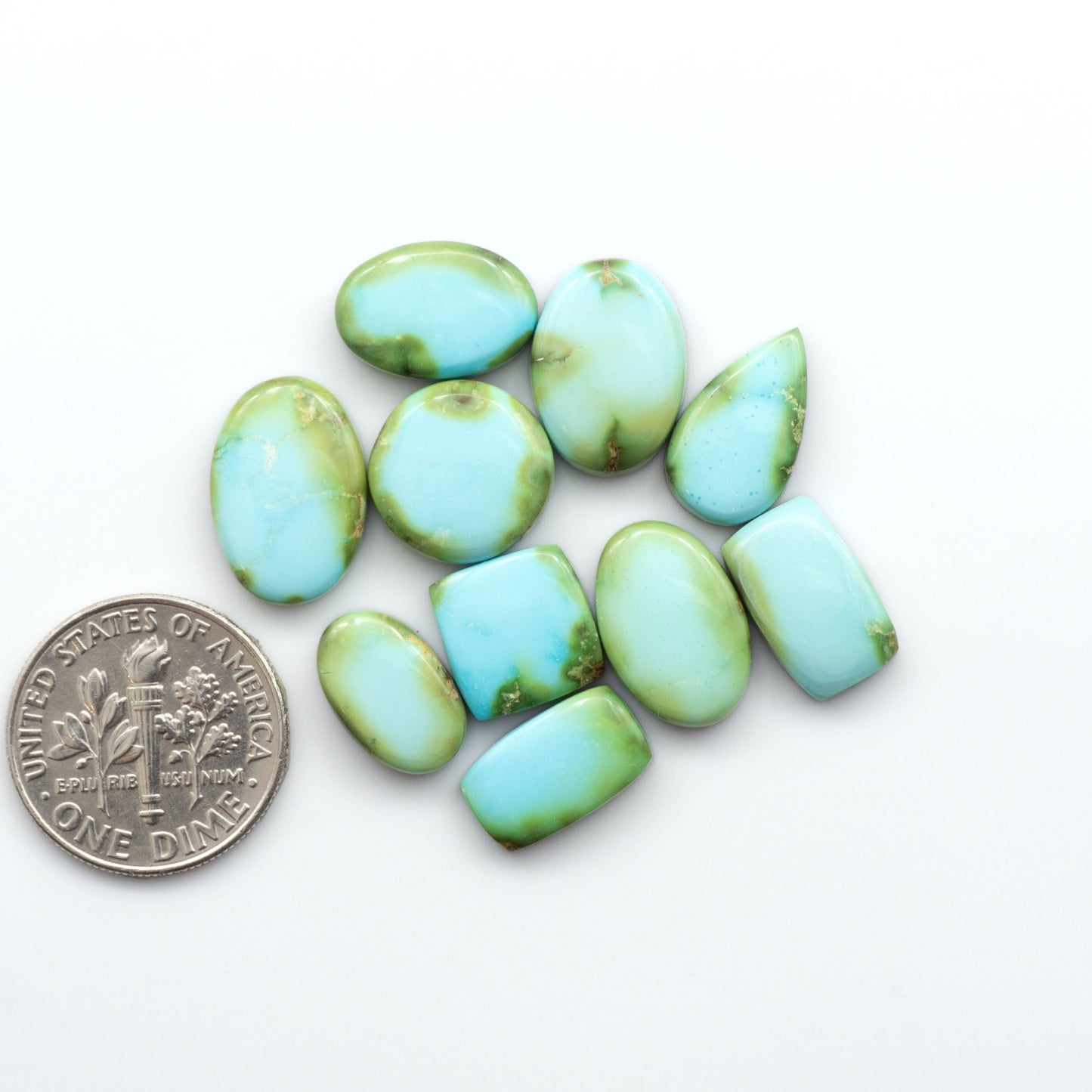 Discover the unique beauty of Sonoran Mountain Turquoise, it's stunning blend of blue and green hues make it a must-have for any jewelry collection. 