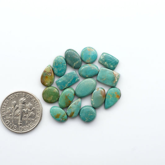 Royston Turquoise cabochons are famous for their distinctive matrix and unique green and blue hues, making them a favored option among jewelry designers.