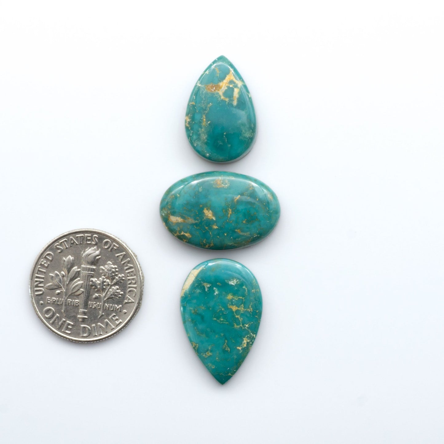 Royston Turquoise cabochons are famous for their distinctive matrix and unique green and blue hues, making them a favored option among jewelry designers.