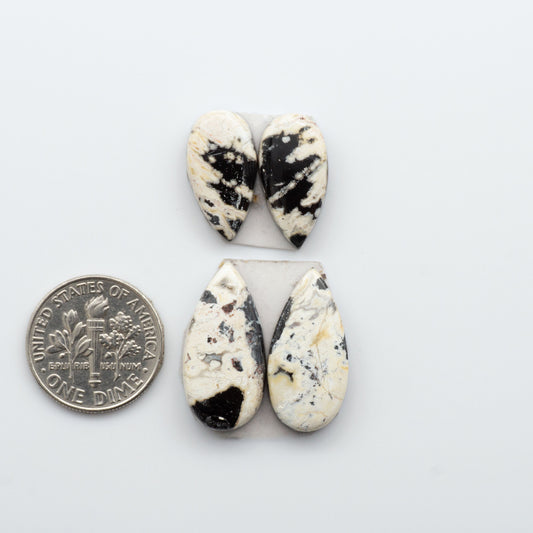 Our Natural White Buffalo Stone Cabochons are semi-precious gemstones cut into shapes ideal for jewelry-making. Making them an excellent choice for artisans.