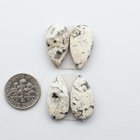 Our Natural White Buffalo Stone Cabochons are semi-precious gemstones cut into shapes ideal for jewelry-making. Making them an excellent choice for artisans.