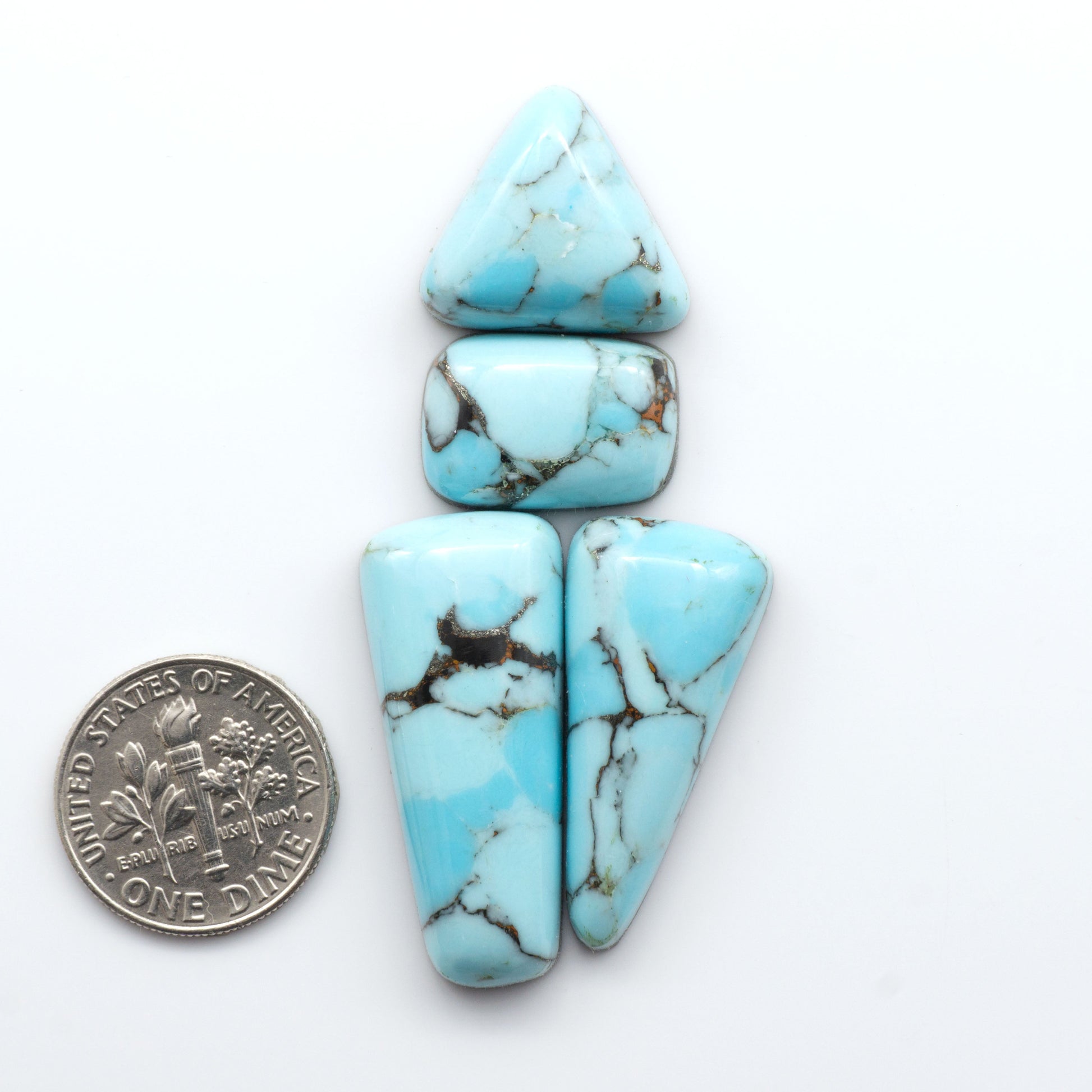 Enhance your jewelry designs with Pressed Turquoise Nugget Cabochons. Crafted from composite materials they add a captivating touch to your creations.