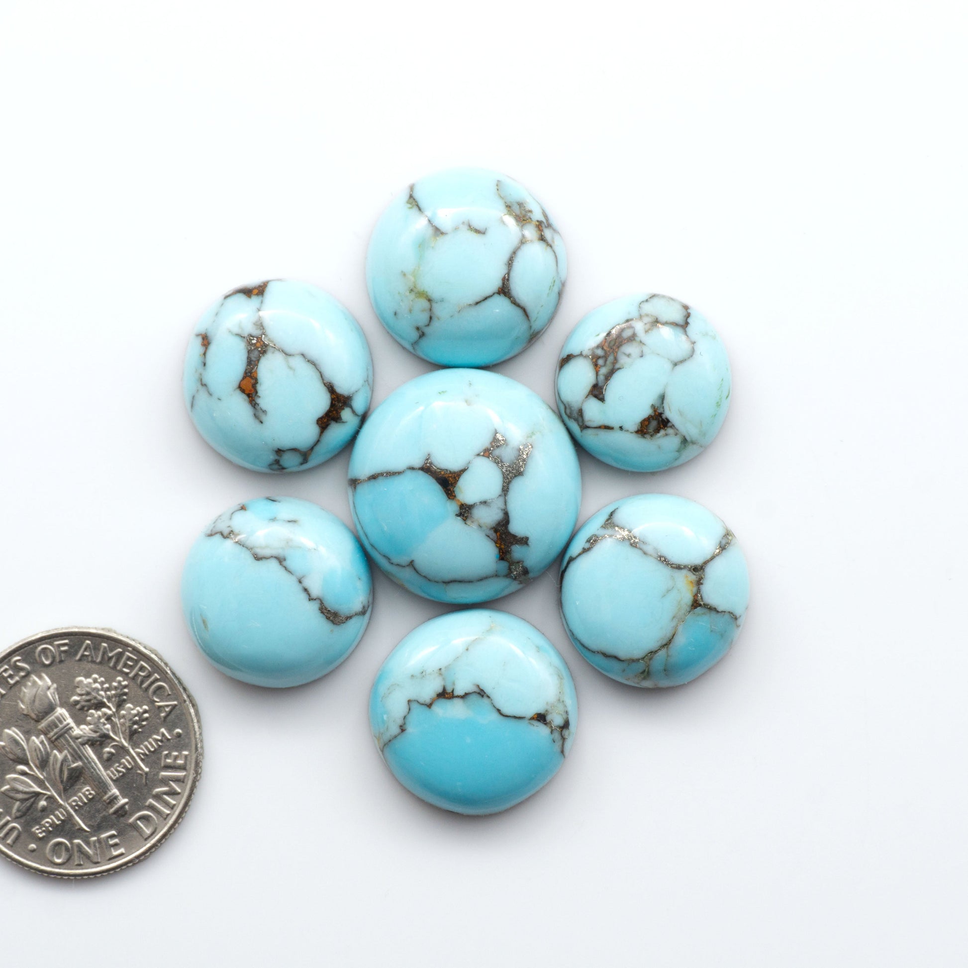 Enhance your jewelry designs with Pressed Turquoise Nugget Cabochons. Crafted from composite materials they add a captivating touch to your creations.