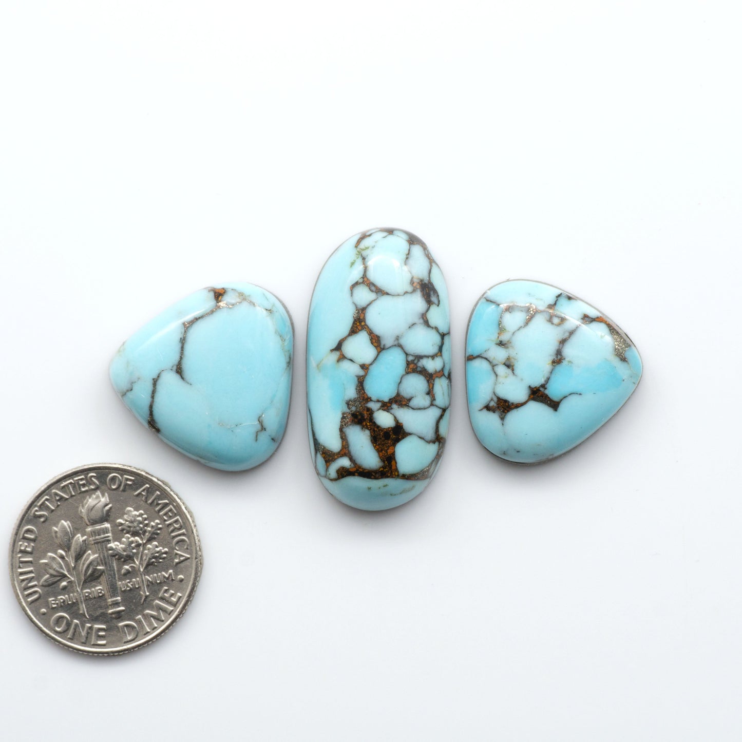 Enhance your jewelry designs with Pressed Turquoise Nugget Cabochons. Crafted from composite materials they add a captivating touch to your creations.