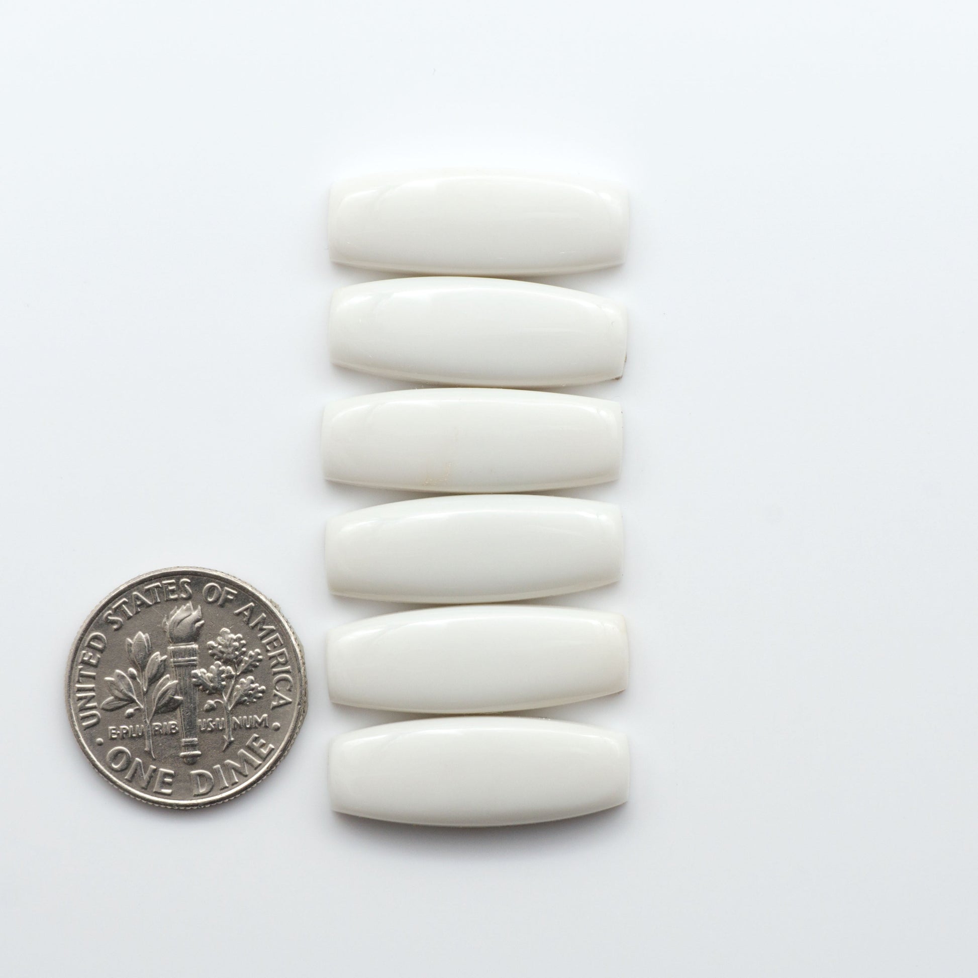 Magnesite Cabochons are a must-have for jewelry makers. These stones feature a unique blend of white and brown, making them perfect for a variety of designs.