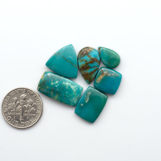 Experience the beauty of Turquoise Mountain Cabochons. With their distinctive blue and green color, these gemstones are perfect for any jewelry piece.