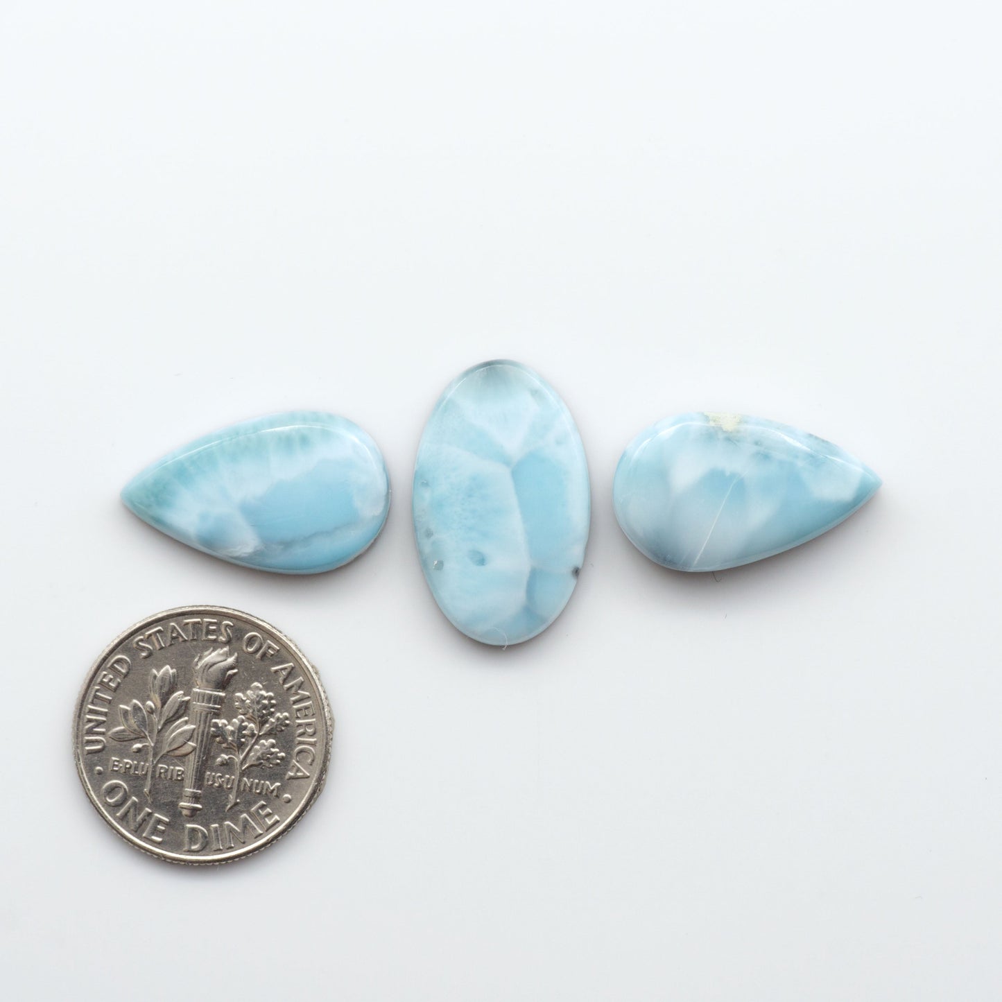 Discover the beauty of Larimar Cabochons. Cut to emphasize the stone's natural patterns and colors. Add a touch of natural beauty to your jewelry designs.