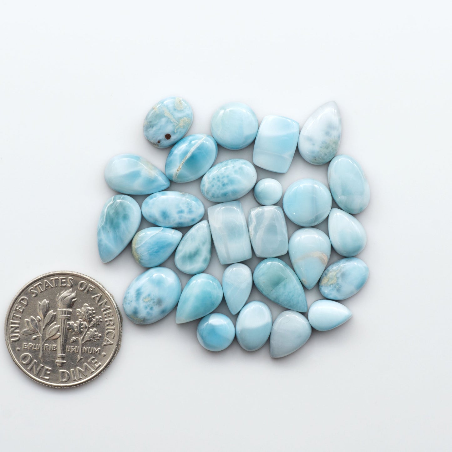 Discover the beauty of Larimar Cabochons. Cut to emphasize the stone's natural patterns and colors. Add a touch of natural beauty to your jewelry designs.